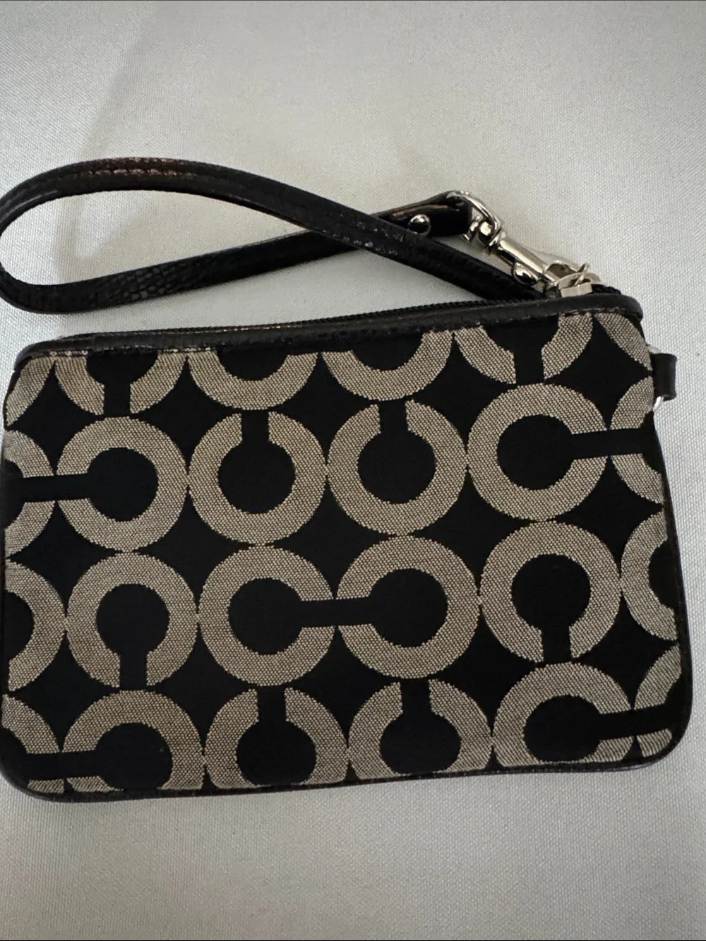Coach Black and Tan Signature Pattern Wristlet